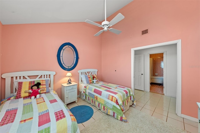 bedroom with light tile patterned flooring, ceiling fan, high vaulted ceiling, baseboards, and visible vents