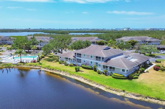 bird's eye view with a water view