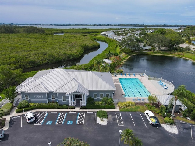 drone / aerial view with a water view