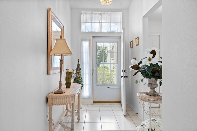 4610 Runabout Way, Bradenton, FL 34203 - entryway featuring light tile patterned floors and baseboards