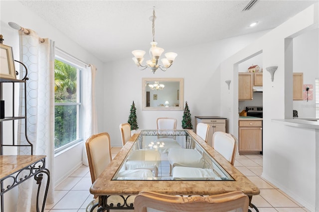 4610 Runabout Way, Bradenton, FL 34203 - dining space featuring a chandelier, light tile patterned floors, a textured ceiling, and baseboards