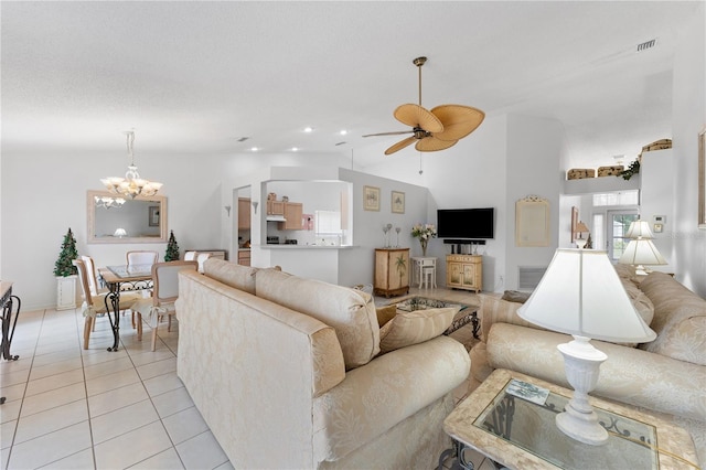 4610 Runabout Way, Bradenton, FL 34203 - living area with a chandelier, a ceiling fan, vaulted ceiling, and light tile patterned flooring