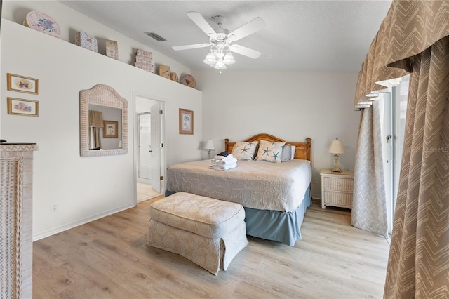 4610 Runabout Way, Bradenton, FL 34203 - bedroom with light wood finished floors, baseboards, and a ceiling fan