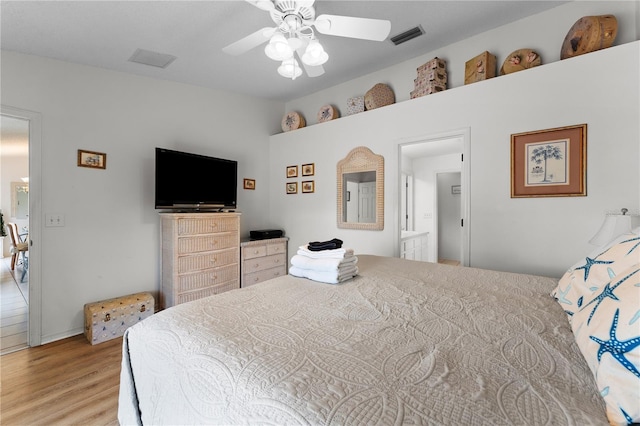 4610 Runabout Way, Bradenton, FL 34203 - bedroom with wood finished floors and ceiling fan