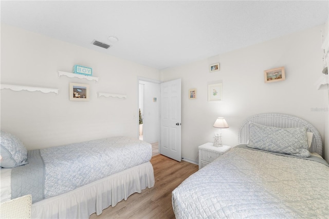 4610 Runabout Way, Bradenton, FL 34203 - bedroom featuring wood finished floors and baseboards