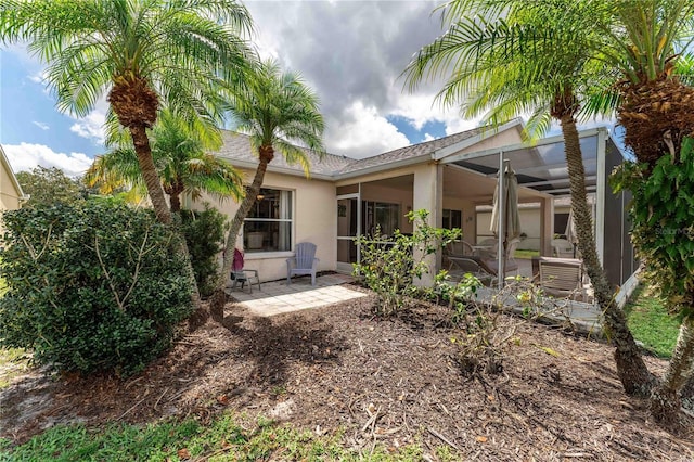 4610 Runabout Way, Bradenton, FL 34203 - rear view of property with stucco siding and a patio