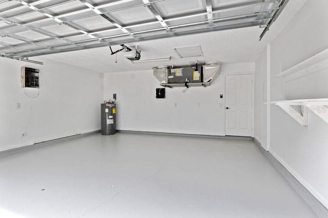 920 36th St W, Bradenton, FL 34205 - garage with water heater and a garage door opener