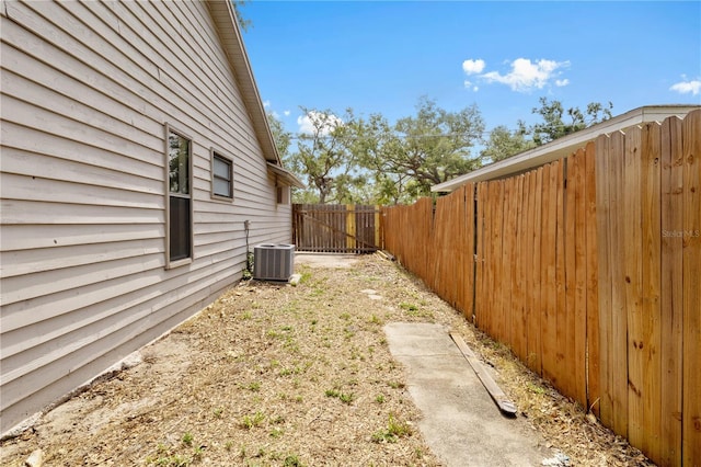 920 36th St W, Bradenton, FL 34205 - view of yard with fence and central air condition unit