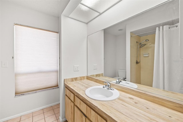 6547 Samoa Dr, Sarasota, FL 34241 - full bathroom featuring toilet, vanity, a tile shower, and tile patterned floors