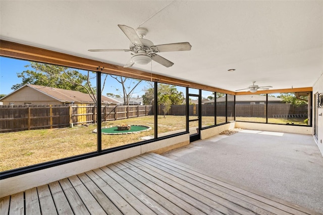 6547 Samoa Dr, Sarasota, FL 34241 - unfurnished sunroom featuring ceiling fan