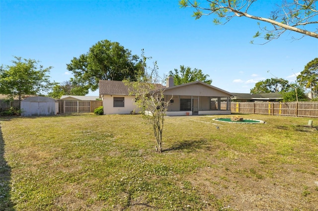 6547 Samoa Dr, Sarasota, FL 34241 - rear view of house with a sunroom and a chimney
