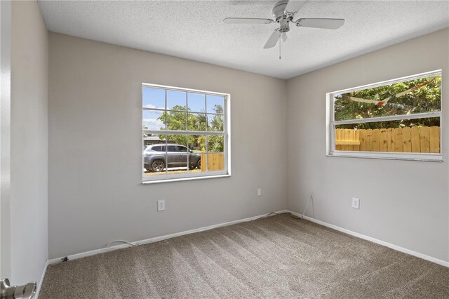 3505 27th Ave W, Bradenton, FL 34205 - carpeted spare room with a ceiling fan, a textured ceiling, and baseboards