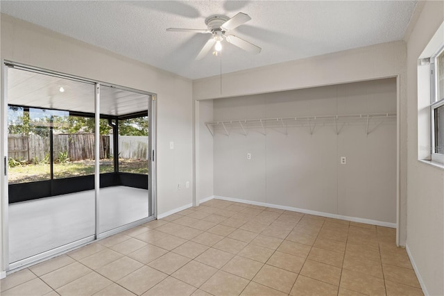 3505 27th Ave W, Bradenton, FL 34205 - unfurnished room with a ceiling fan, a textured ceiling, and light tile patterned floors