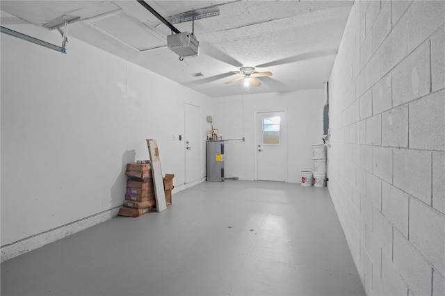 3505 27th Ave W, Bradenton, FL 34205 - garage featuring water heater, a garage door opener, and concrete block wall