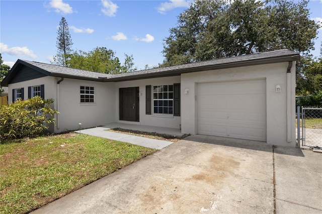 3505 27th Ave W, Bradenton, FL 34205 - ranch-style house with a garage, stucco siding, and driveway