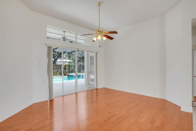 1125 English Garden Ln, Winter Garden, FL 34787 - empty room featuring ceiling fan, baseboards, a sunroom, and light wood finished floors
