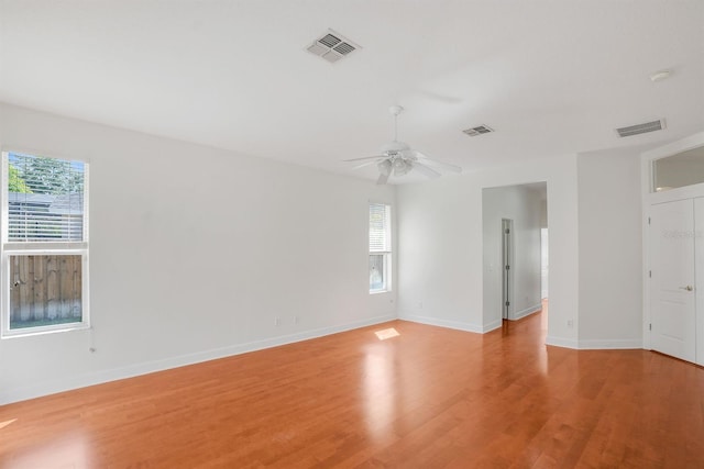 1125 English Garden Ln, Winter Garden, FL 34787 - spare room featuring light wood-style floors, visible vents, and a ceiling fan