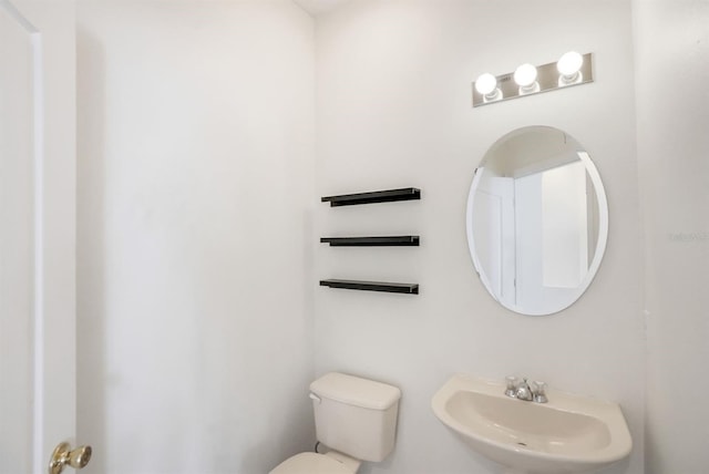 1125 English Garden Ln, Winter Garden, FL 34787 - half bathroom featuring toilet and a sink