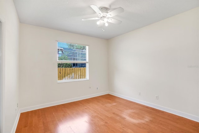 1125 English Garden Ln, Winter Garden, FL 34787 - spare room with baseboards, light wood-style floors, and ceiling fan