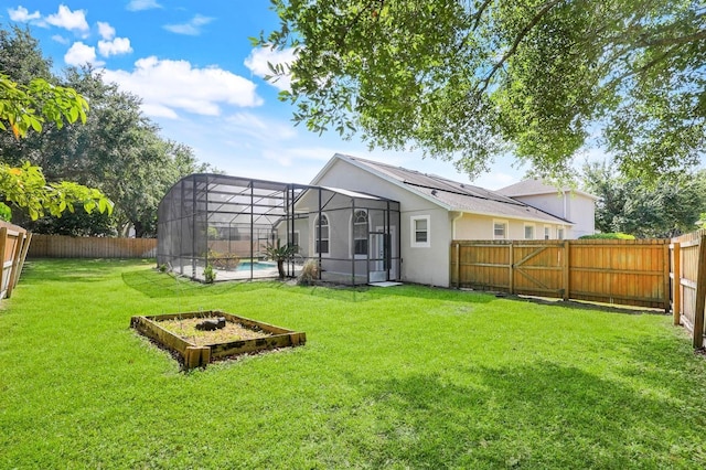 1125 English Garden Ln, Winter Garden, FL 34787 - view of yard featuring a fenced backyard, a fenced in pool, and glass enclosure