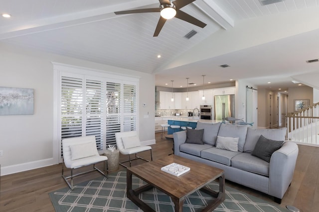 222 Willow Ave, Anna Maria, FL 34216 - living room with vaulted ceiling with beams, recessed lighting, wood finished floors, and visible vents