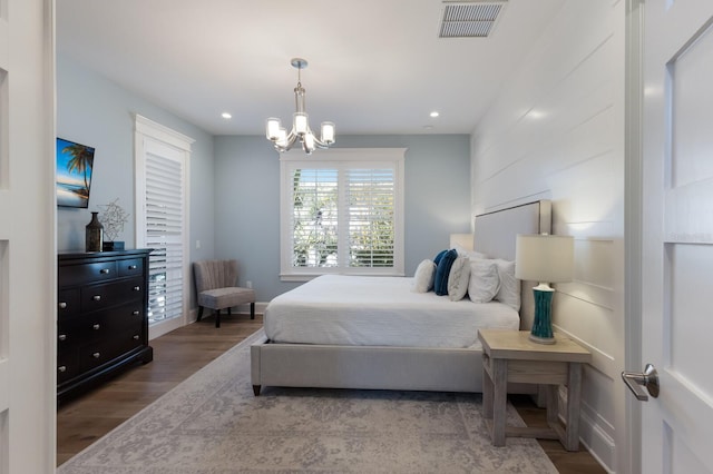 222 Willow Ave, Anna Maria, FL 34216 - bedroom with recessed lighting, a notable chandelier, visible vents, and wood finished floors