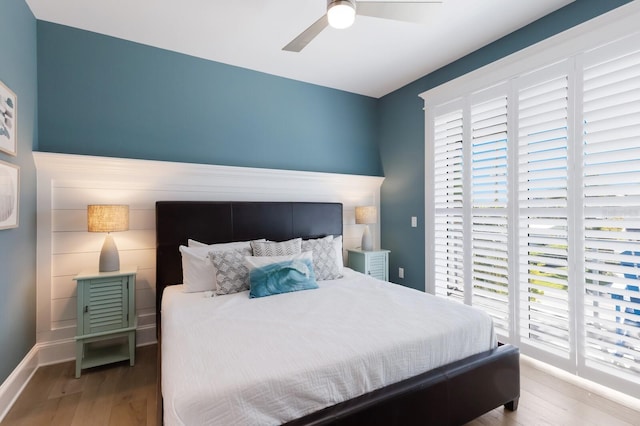 222 Willow Ave, Anna Maria, FL 34216 - bedroom featuring baseboards, ceiling fan, and wood finished floors