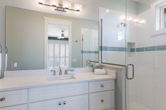 222 Willow Ave, Anna Maria, FL 34216 - full bath featuring vanity, ceiling fan, and a stall shower