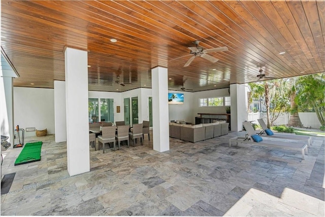 222 Willow Ave, Anna Maria, FL 34216 - view of patio / terrace with outdoor dining area, ceiling fan, and an outdoor living space