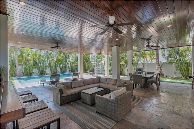 222 Willow Ave, Anna Maria, FL 34216 - view of patio / terrace with stairway, ceiling fan, outdoor dining area, and an outdoor hangout area