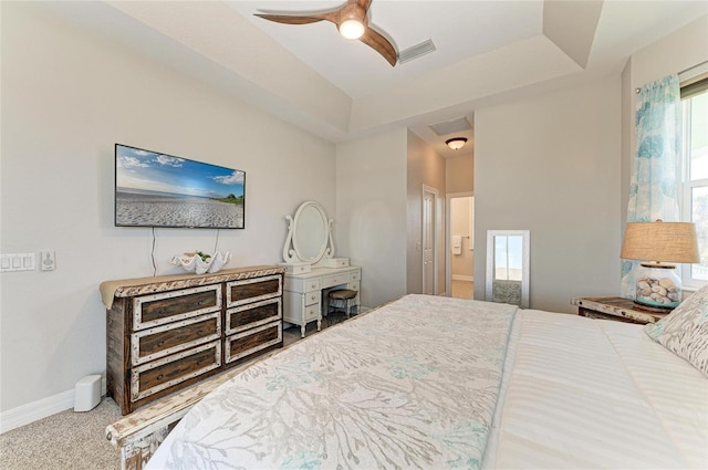 bedroom with baseboards, carpet, ceiling fan, and visible vents