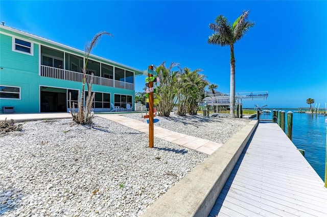 dock area with a water view