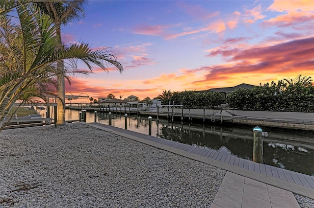 dock area with a water view