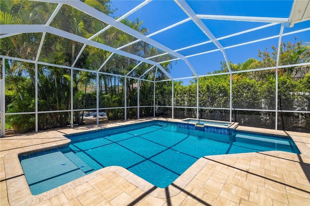 7804 Edmonston Cir, University Park, FL 34201 - view of swimming pool featuring a patio, a pool with connected hot tub, and a lanai