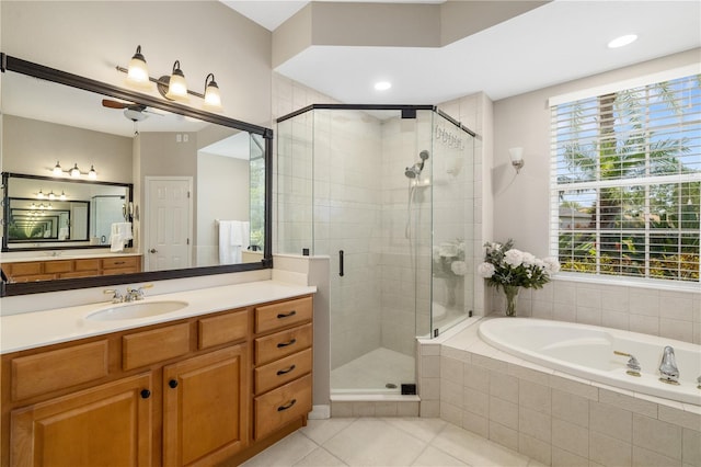 7804 Edmonston Cir, University Park, FL 34201 - full bath featuring a healthy amount of sunlight, tile patterned flooring, a shower stall, and a garden tub