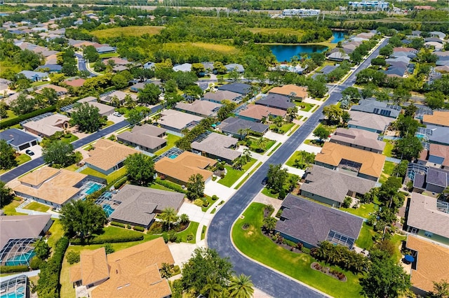 7804 Edmonston Cir, University Park, FL 34201 - aerial view featuring a water view and a residential view