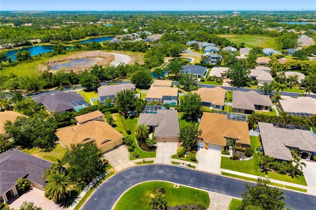 7804 Edmonston Cir, University Park, FL 34201 - bird's eye view featuring a water view and a residential view