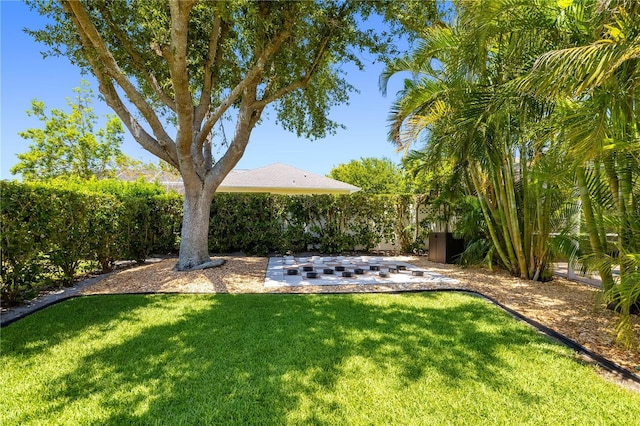 7804 Edmonston Cir, University Park, FL 34201 - view of yard featuring a patio area and fence