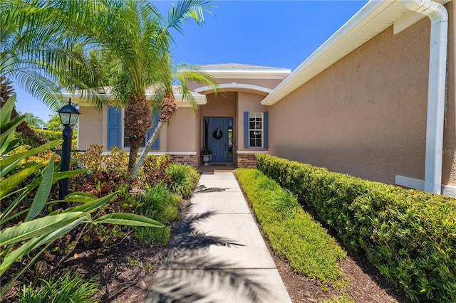 7804 Edmonston Cir, University Park, FL 34201 - entrance to property featuring stucco siding