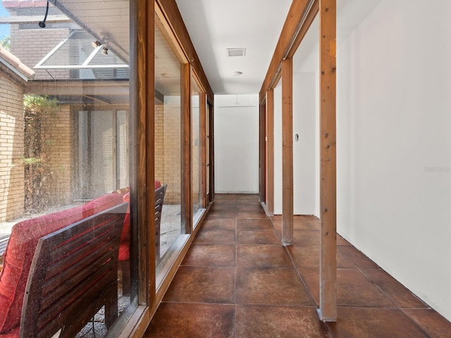 hallway featuring healthy amount of natural light