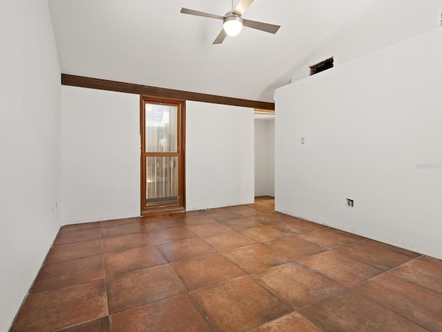 unfurnished room with a ceiling fan and high vaulted ceiling