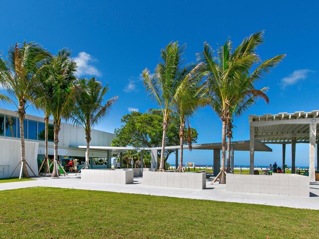 view of community featuring a lawn