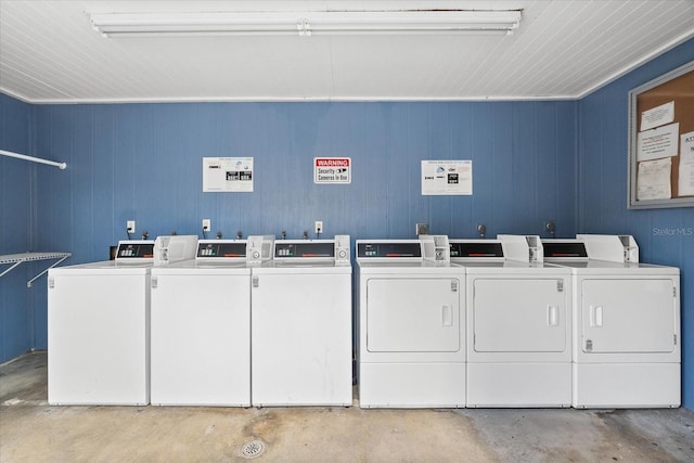 community laundry room featuring washer and dryer