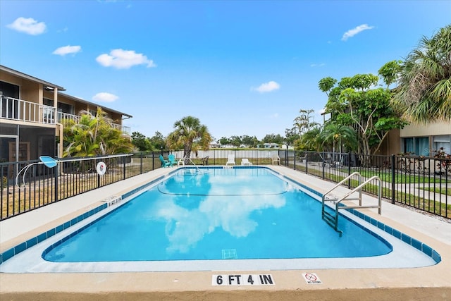 pool featuring fence