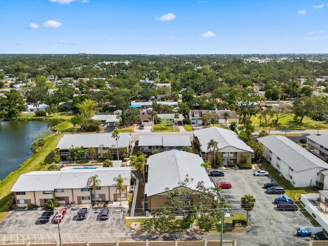 bird's eye view with a water view and a residential view