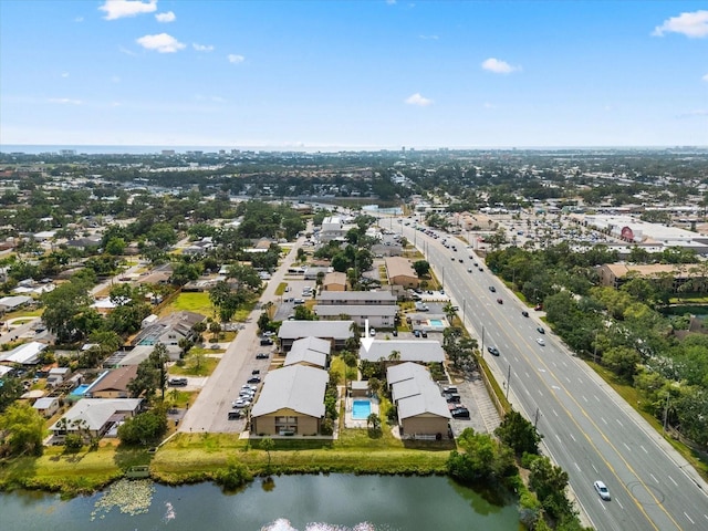 bird's eye view with a water view and a residential view