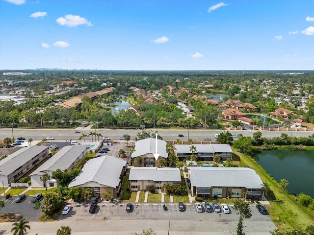 aerial view with a water view and a residential view