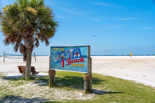 exterior details featuring a view of the beach
