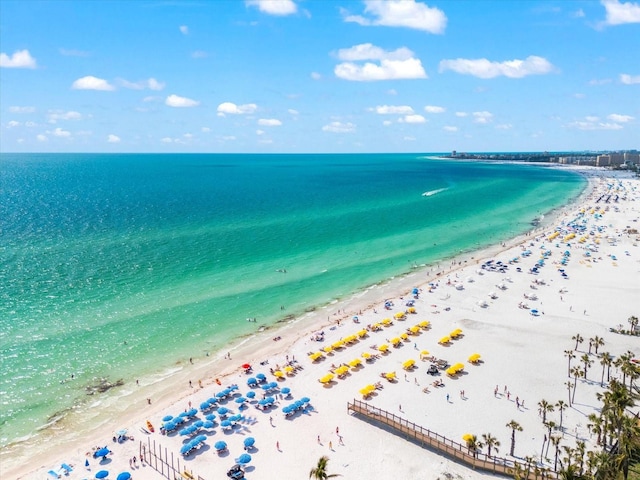 bird's eye view featuring a beach view and a water view