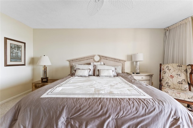 6460 Mourning Dove Dr Unit 102, Bradenton, FL 34210 - bedroom featuring carpet, a textured ceiling, and baseboards